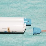 Figure 11 A cartridge mixing system with its spiral delivery tube prior to attachment (Protemp 4, 3M ESPE)