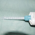 Figure 12 Cartridge delivery system containing a bite registration material with mixing tip in situ to prevent cross-contamination between the two tubes leading to premature set (Memosil 2, Heraeus Kulzer)