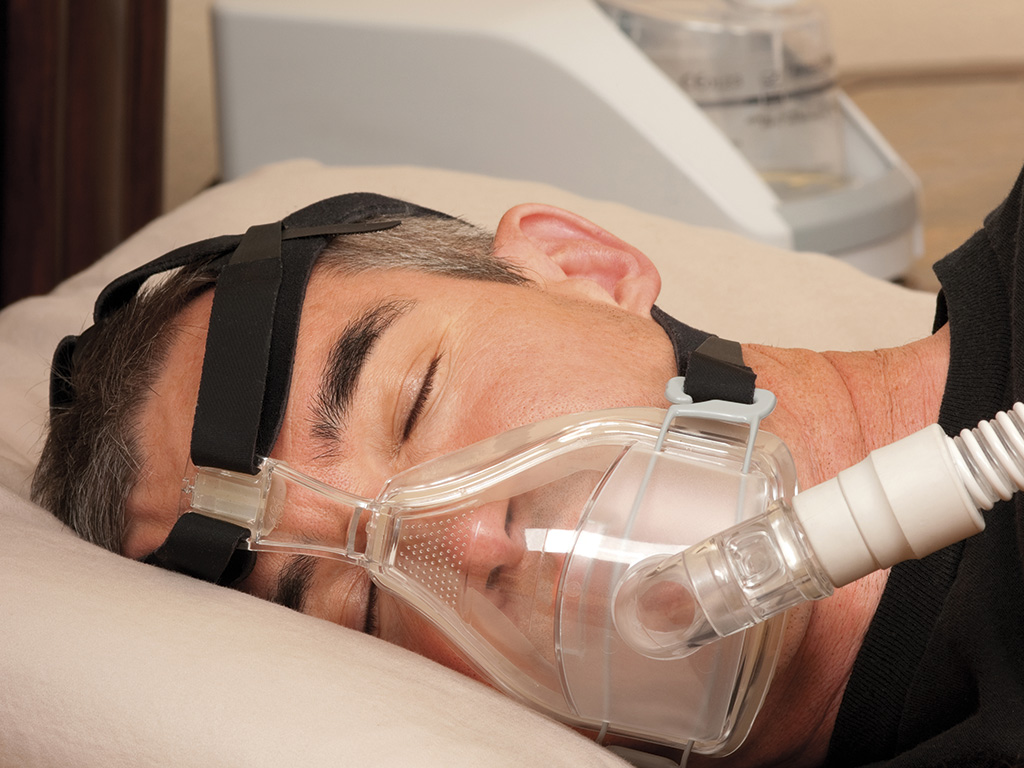 Continuous positive airway pressure (CPAP) machine in use