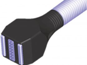 FIGURE 2: RF handpiece with two central rows of seven smooth RF-emitting positive electrodes (14 polar) with current flowing from the positive electrodes to the two negative side electrodes.