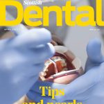 Cover of Scottish Dental magazine April 2022 with a close up picture of a patient being operated on on