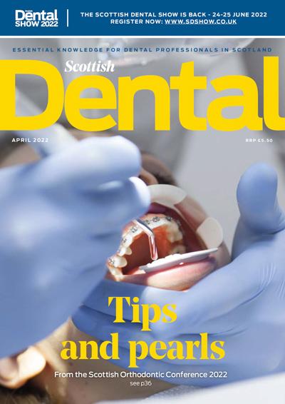 Cover of Scottish Dental magazine April 2022 with a close up picture of a  patient being operated on