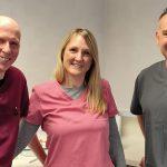 John Wall, general practitioner with a specialist interest in implants, with Emma and Kenneth Kendall