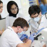 A student demonstrates a procedure in one of the new labs