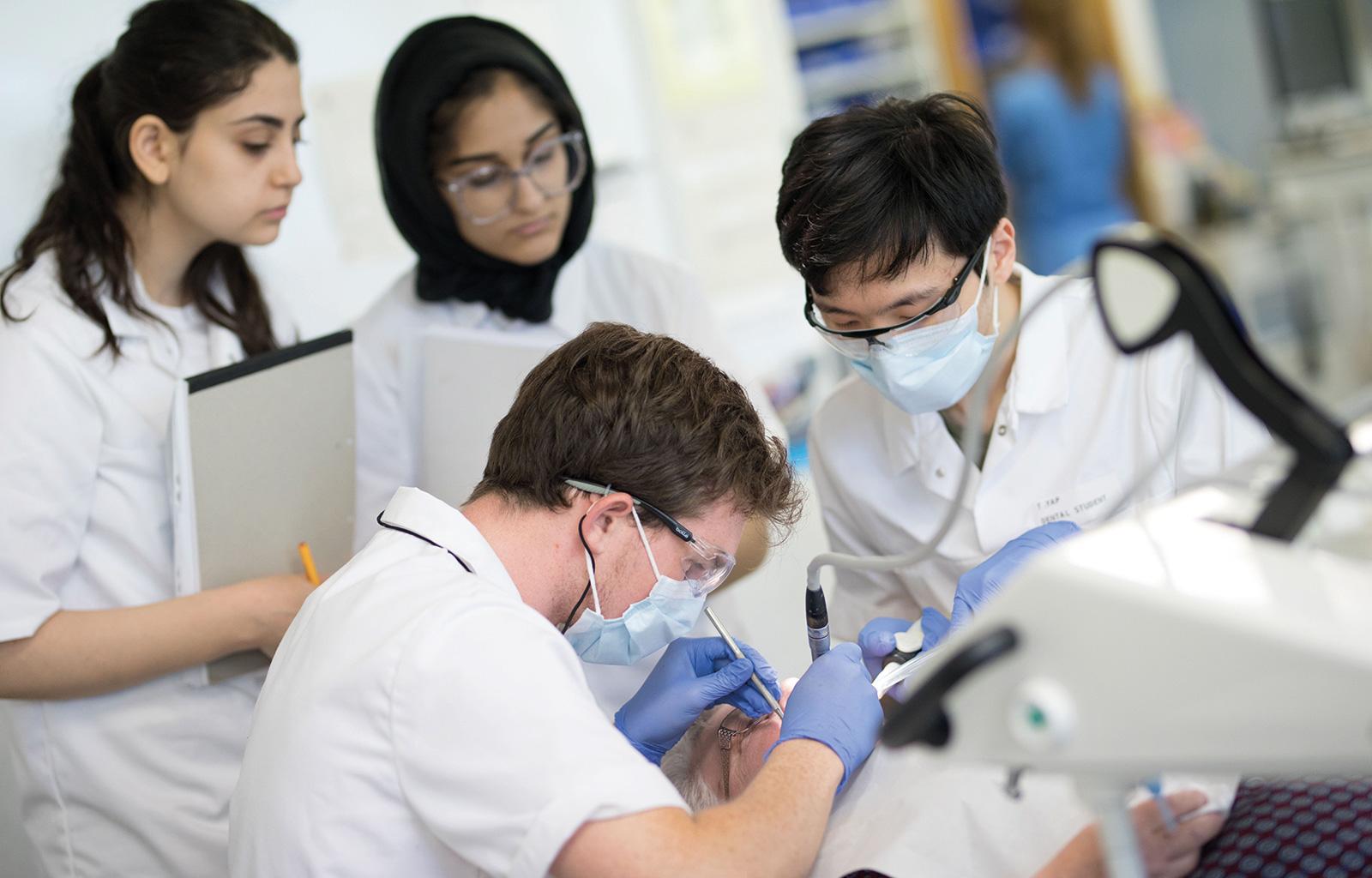 A student demonstrates a procedure in one of the new labs